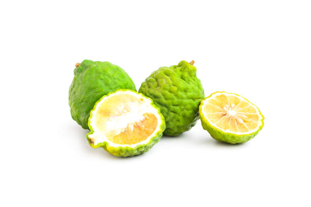 istock Fresh bergamot fruit or kaffir lime fruit and cut in half slice  isolated on white background,  Organic herbal fruit 1813093268