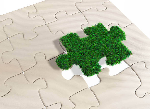 istock puzzle piece of grass 181310683