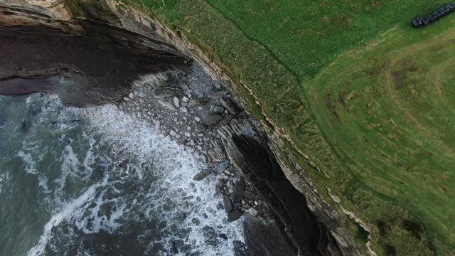 Aerial view of cliffs by the sea