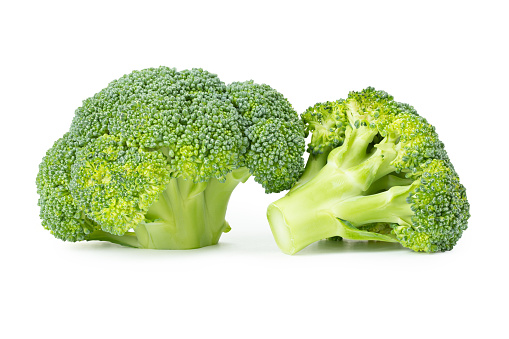 Fresh broccoli inflorescence isolated on white background. File contains clipping path