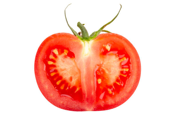istock Half a tomato isolated on white background. Perfect retouched tomato top view. File contains clipping path. 1813132015