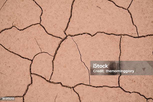 Dried Mud That Has Cracked Into A Interesting Pattern Stock Photo - Download Image Now