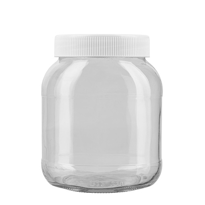 Empty glass jar with white plastic lid isolated on white background. File contains clipping path. Full depth of field.