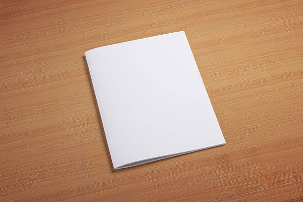 istock Blank closed magazine on wooden background 181316127