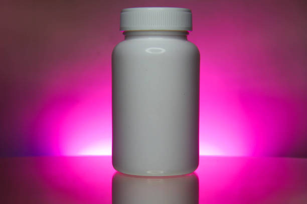 White plastic medical container Clearly for pills or capsules.Blank Slate