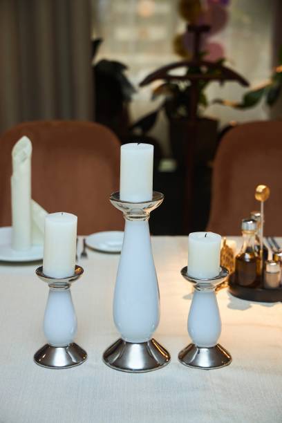 istock The light is also in the candlesticks on the festive table. Interior decoration 1813188982
