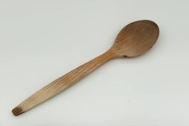 istock Wooden spoon on white background 1813199477