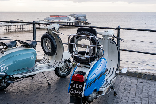 Cromer, Norfolk, UK  November 6 2023. Classic vespa scooters at Cromer seafront on the North Norfolk coast
