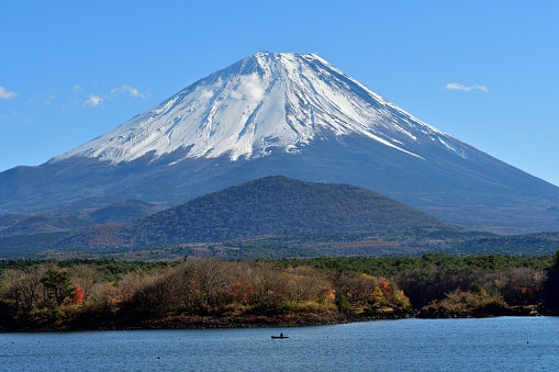 Mount Fuji in Japan in winter. A volcano covered with snow. Snow mountain from afar