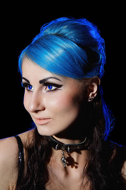 istock Beautiful young gothic woman with blue hairs 181324807
