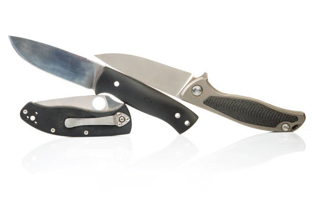 istock three different folding knives on a white background. item for tourism and survival 1813250880