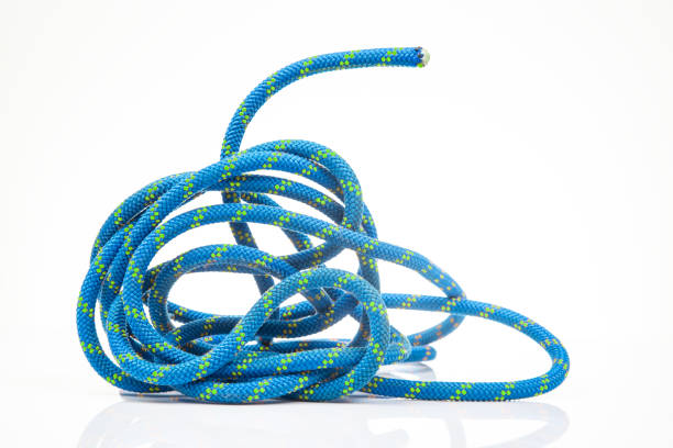 istock durable colored rope for climbing equipment on a white background. climbing rope. coil of braided cable. item for tourism and travel 1813251302
