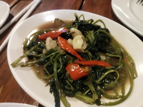 Stir fried of Chianease kale vegetables with pork , Thai style food