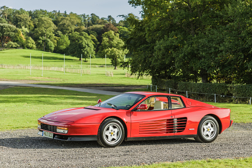 Chester, Cheshire, England, September 29th 2023. Red Ferrari Testarossa with drive in the background.