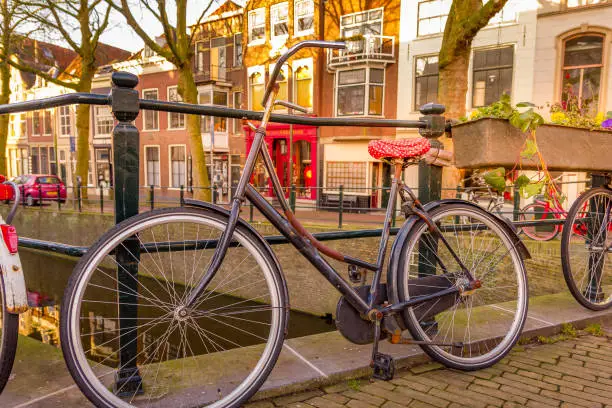 Photo of Bicycles in a canal in Gouda, The Netherlands