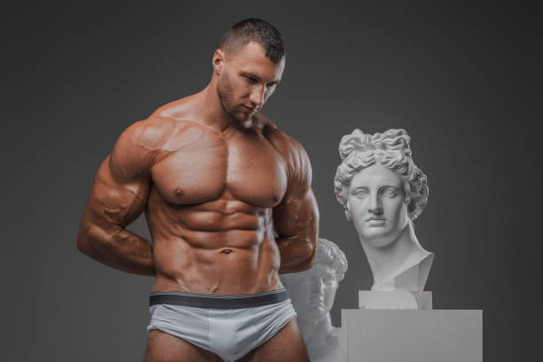 Rugged Beauty: Muscular Man and Ancient Greek Statues