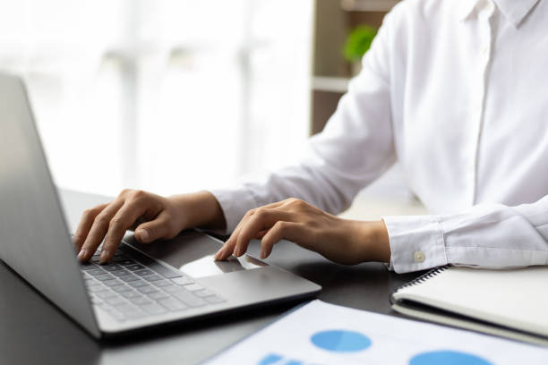 istock Businesswoman analyzing business reports and financial data on laptop. 1813258270