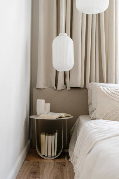 istock Night side table and comfort bed in bedroom with scandinavian interior 1813264845