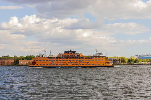 USA. 09.25.2023. Beautiful view of Staten Island tourist ferry cruising along Hudson River in New York.