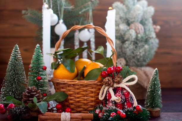 istock New Year's tangerines in a wicker basket. Festive atmosphere 1813266425