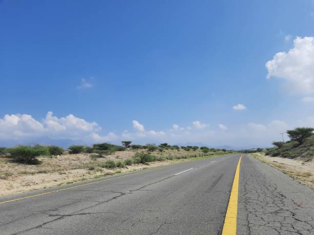 istock Mountain road in a desert mountains town 1813284311