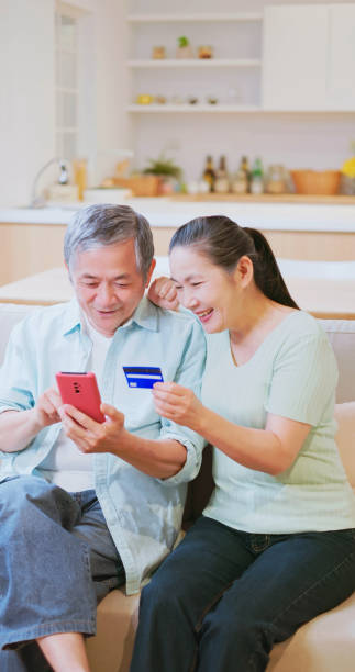 istock old couple online shopping 1813308086