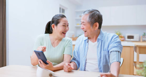istock old couple test blood pressure 1813309123
