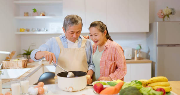 istock Asian elderly couple drink milk 1813314803