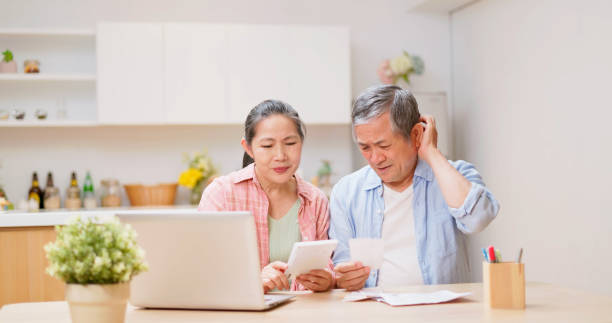 istock old couple look bill 1813322215