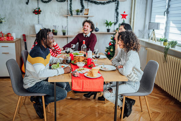 istock Friends having Christmas lunch 1813353593