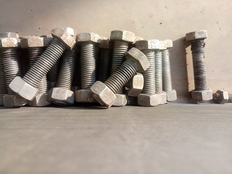 stainless steel nuts and bolts with copy space