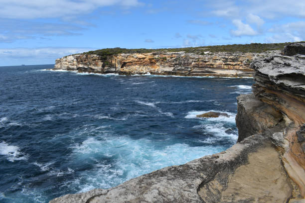 istock Ocean and snadstone cliffs, Magic Point, Malabar, Sydney, NSW, Australia 1813388220