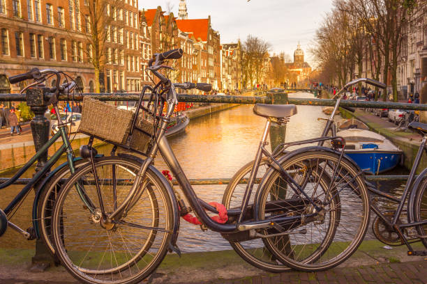 istock View of an Amsterdam canal and bicycles 1813405088