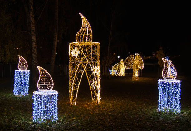 istock Candle decoration made from small lights at night. Christmas background 1813442909
