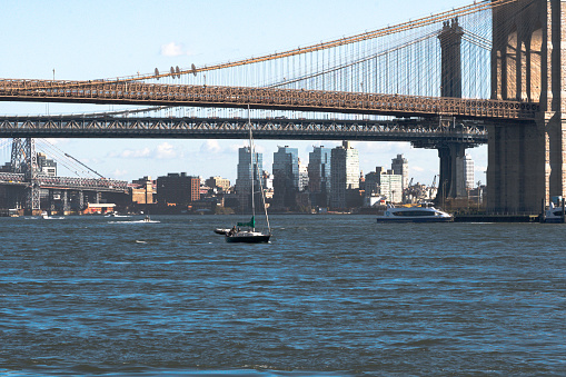 The Manhattan bridge and the Brooklyn Bridge as seen from a ferry on the East River
