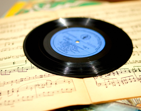 vinyl records lie on a colored background