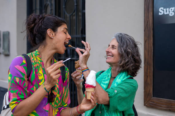 istock Two female tourists walking through the city 1813499963