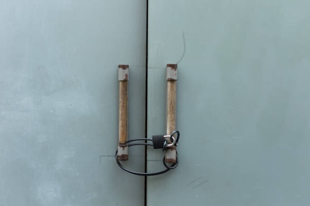 Padlocked door. Centre of Krakow