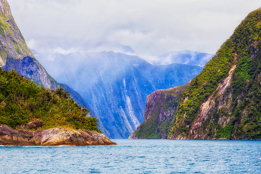 Milford sound fiord on West Coast of South island in New Zealand from tourist cruise boat tour.