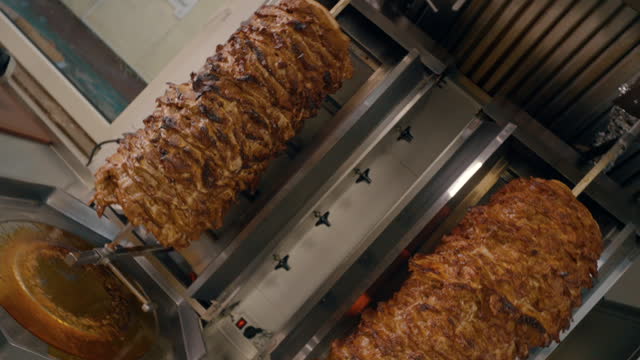Greek gyros meat rotating kebab roll camera move