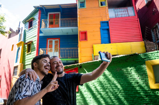 lgtbq tourism gay tourist couple in Buenos Aires La Boca, Caminito argentinian people stock pictures, royalty-free photos & images