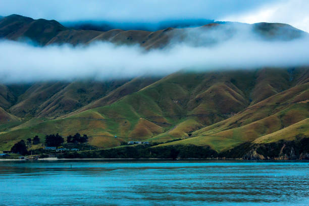 Sailing on the Inter-islander ferry through the Sounds on a cloudy moody day