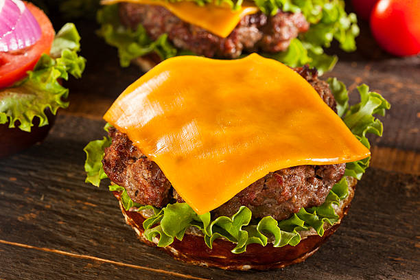 istock Gourmet Cheese Burger on a Pretzel Roll 181366308