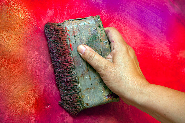 istock How to make original wall, close-up painting. 181368264