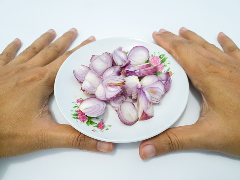 Cutting and chopping Red Onions - Food preparation.
