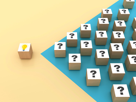 Question Blocks with Light Bulb - Color Background - 3D Rendering