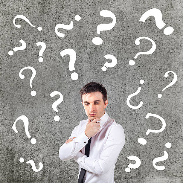 istock confused businessman on grunge background 181383018