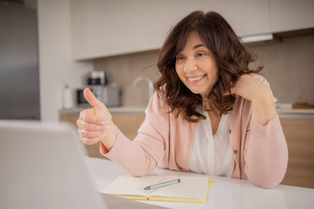 istock Mature woman working from home 1813856334