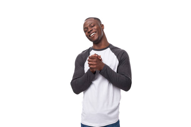 istock young happy african guy dressed in a sweatshirt feels joy 1813860858