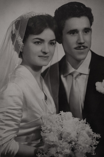 Portrait of beautiful young woman, 1950s archive photo from family album